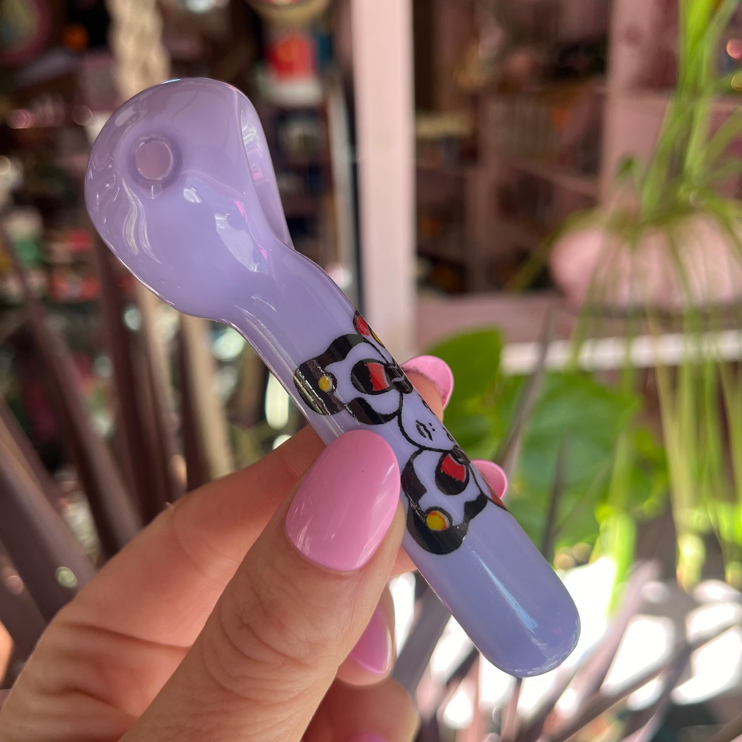 side view moth girl glass pipe from the best smoke shop on the internet