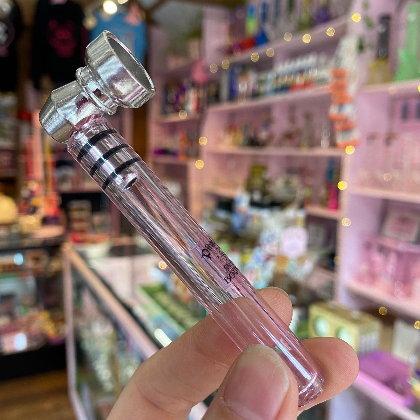 Pink Glass and Metal Pipe