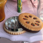 cute cookie weed grinder from the girly online smoke shop